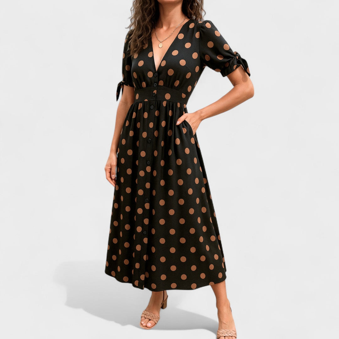 Eva – Vestido Midi de Lunares que realza tu feminidad