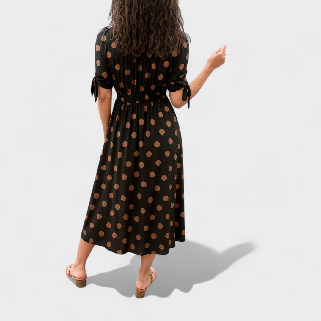 Eva – Vestido Midi de Lunares que realza tu feminidad