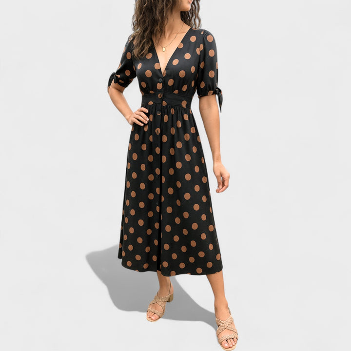 Eva – Vestido Midi de Lunares que realza tu feminidad