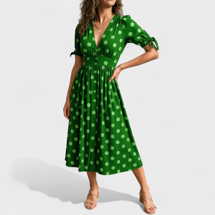 Eva – Vestido Midi de Lunares que realza tu feminidad