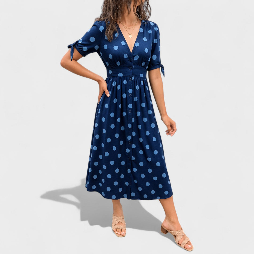 Eva – Vestido Midi de Lunares que realza tu feminidad