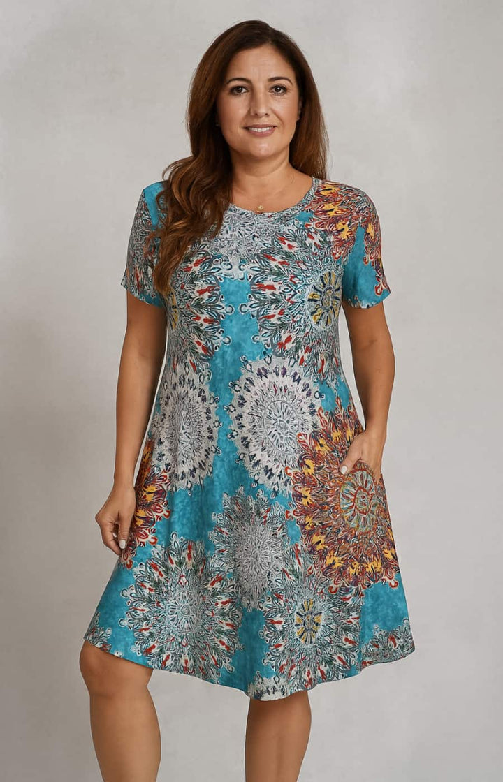GABRIELA | VESTIDO DE VERANO CON ESTAMPADO TROPICAL Y BOLSILLOS OCULTOS
