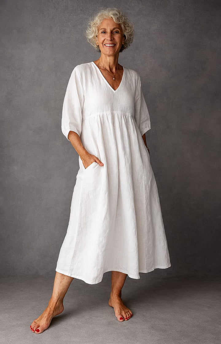 ÁNGELA | VESTIDO MIDI CON BOLSILLOS EN TEJIDO LUJOSO – CON LIGEREZA Y CALMA