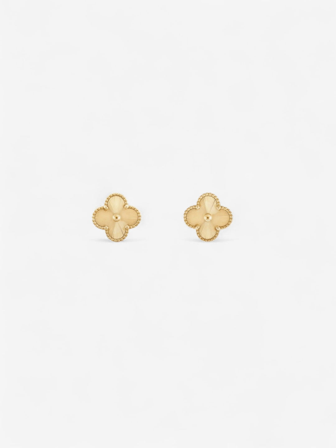 FLORA STUDS | PENDIENTES FLORALES CON BRILLO SUTIL
