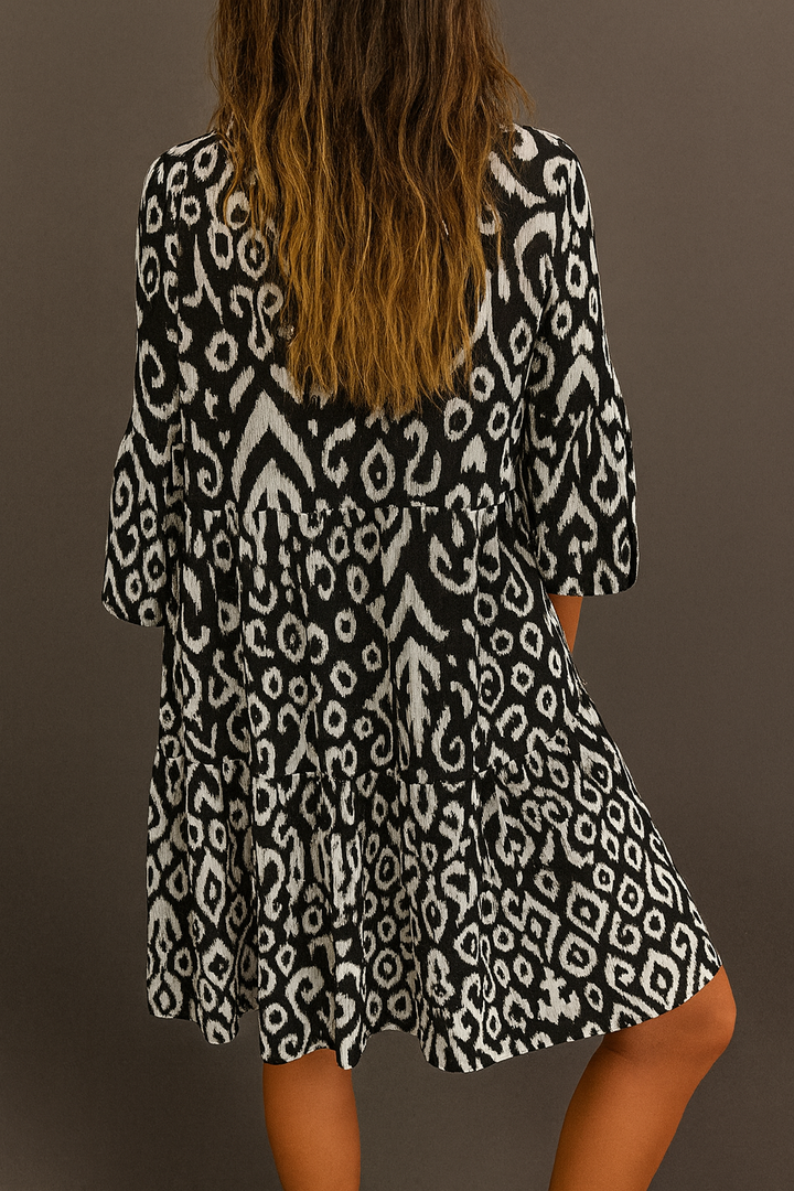 LUNA | VESTIDO CON ESCOTE EN V Y DETALLES SUTILES