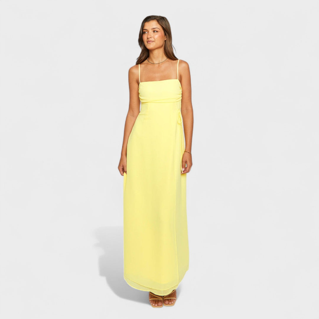 Flossie – Vestido Maxi Amarillo con Lazo Lateral que realza tu frescura