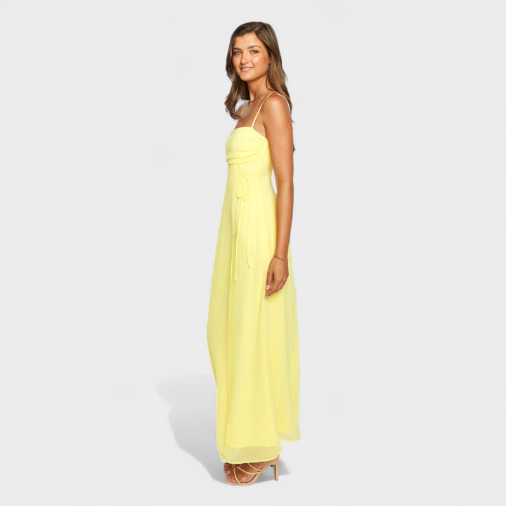Flossie – Vestido Maxi Amarillo con Lazo Lateral que realza tu frescura