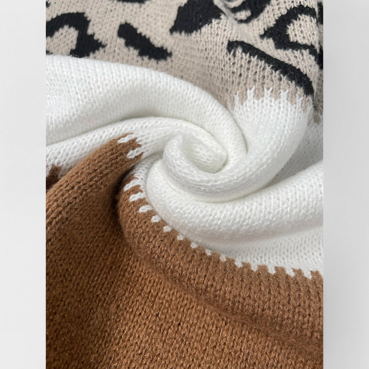 MARTINA | JERSEY LEOPARDO ELEGANTE CON CUELLO ALTO