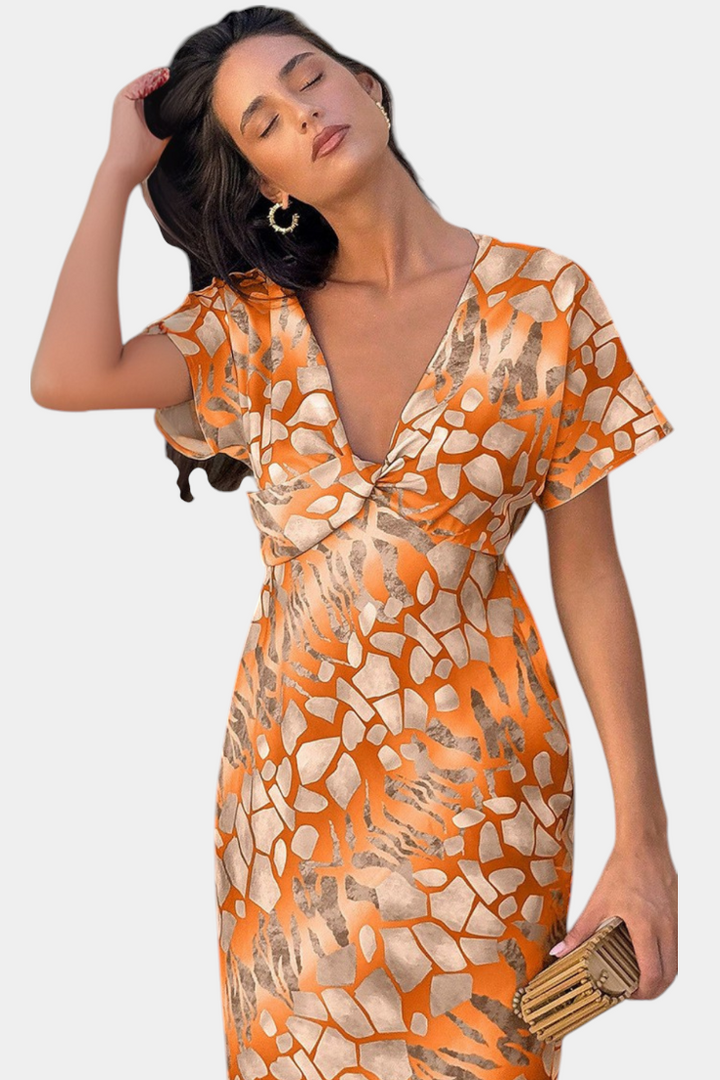 Triana – Vestido con Estampado Abstracto que Realza tu Estilo Moderno