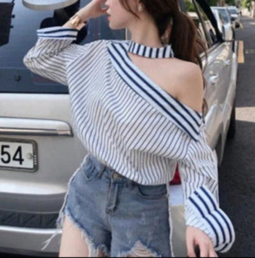 Mia - Elegante camiseta a rayas con hombros descubiertos