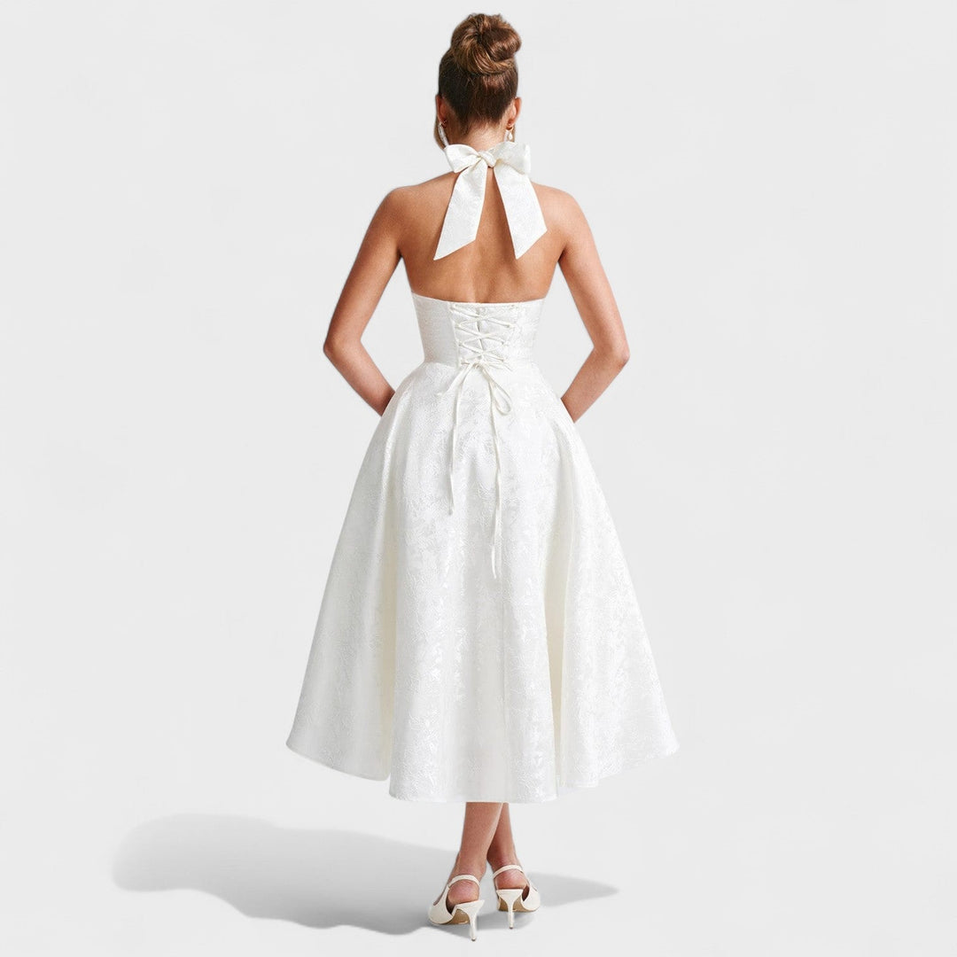 Effie – Vestido Midi Texturizado con Escote Halter que resalta tu feminidad