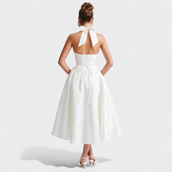 Effie – Vestido Midi Texturizado con Escote Halter que resalta tu feminidad