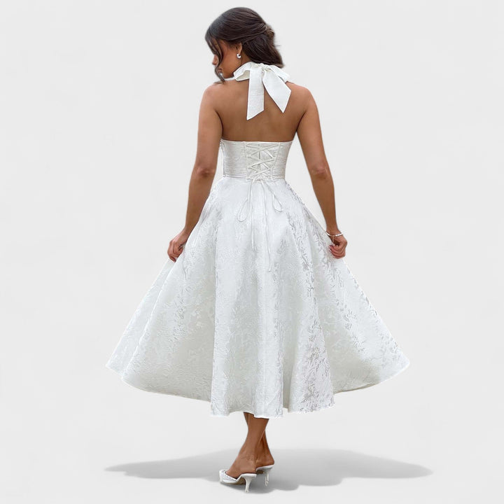 Effie – Vestido Midi Texturizado con Escote Halter que resalta tu feminidad