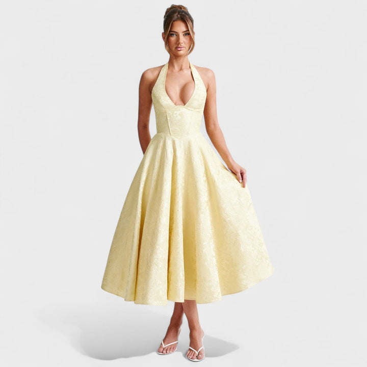 Effie – Vestido Midi Texturizado con Escote Halter que resalta tu feminidad