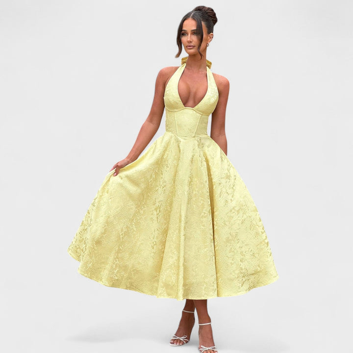 Effie – Vestido Midi Texturizado con Escote Halter que resalta tu feminidad