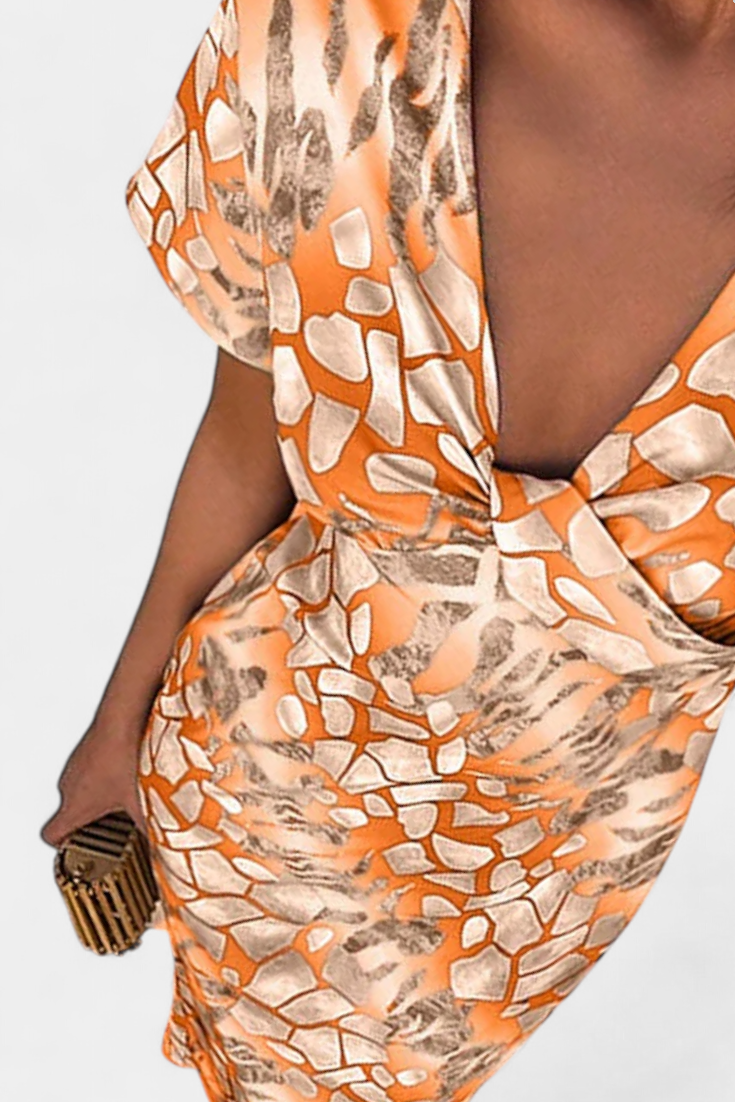 Triana – Vestido con Estampado Abstracto que Realza tu Estilo Moderno