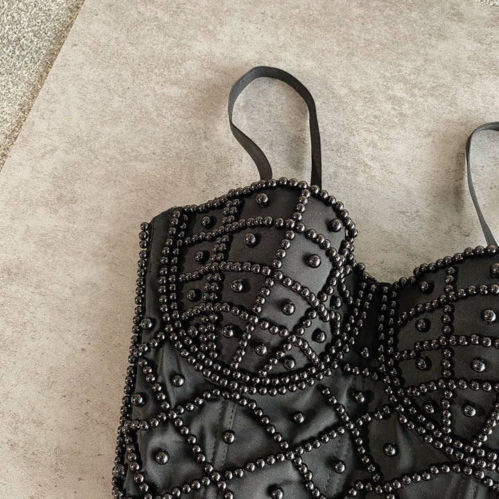 Top bustier mujer con pedrería negra - Anastacia
