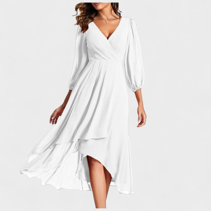 Rita – Vestido con escote en V y falda asimétrica que redefine la elegancia